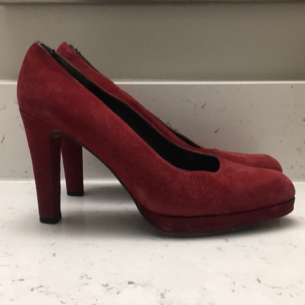Red suede pumps